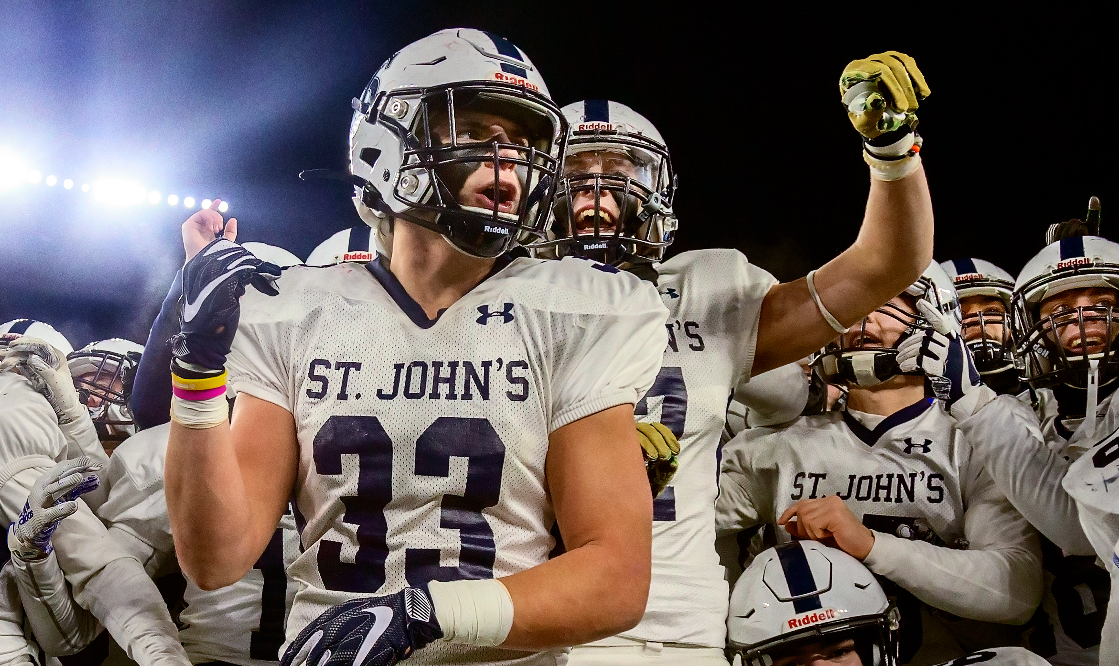 St. John's football team celebration after a win