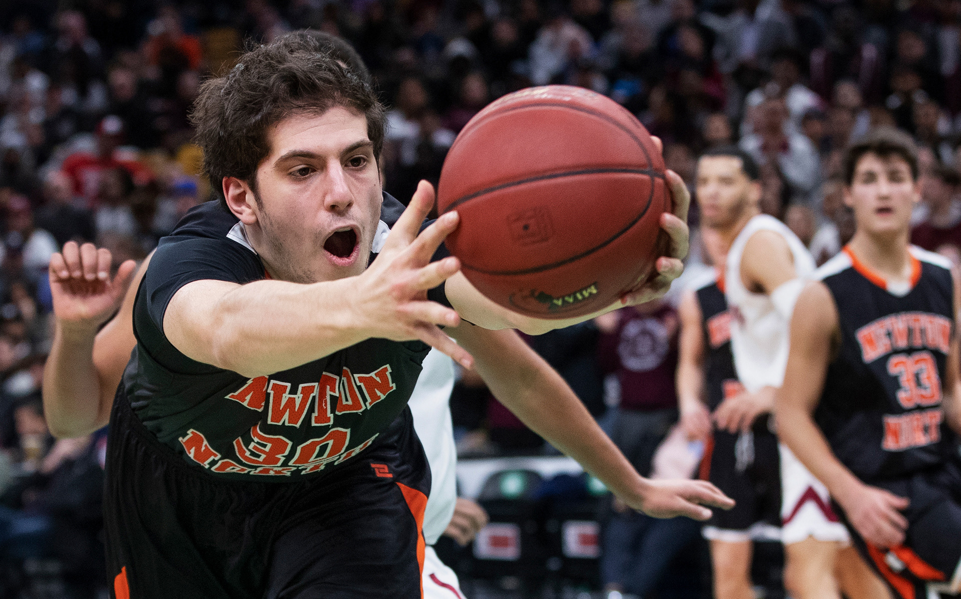 Fan wearing flag hat at sporting event