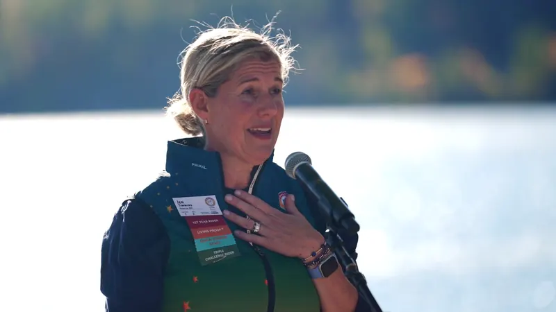 Jen Timmins giving the PMC Unpaved 2026 Living Proof toast by the lake, Snowcap Productions