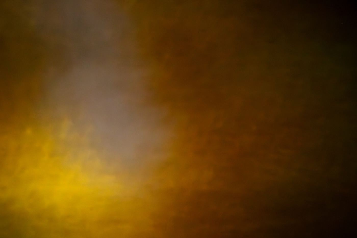 Ember: a study in warm light and shadow glowing like an ember, Salem, Massachusetts, intentional camera movement