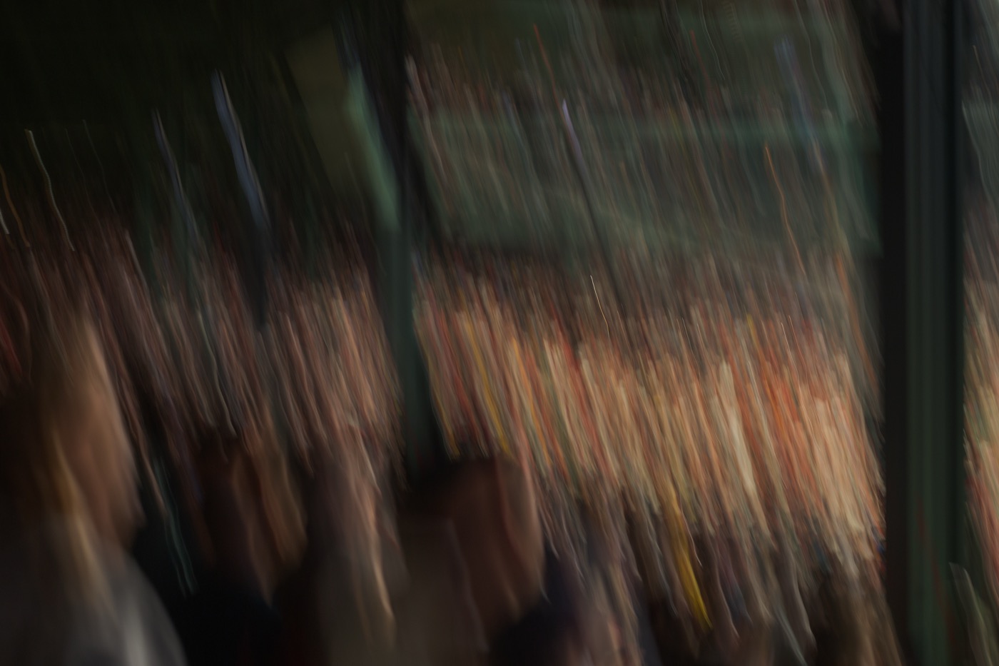 Standing Room: a whole section of Fenway Park rising to its feet, arms in the air, captured with an upward whip pan